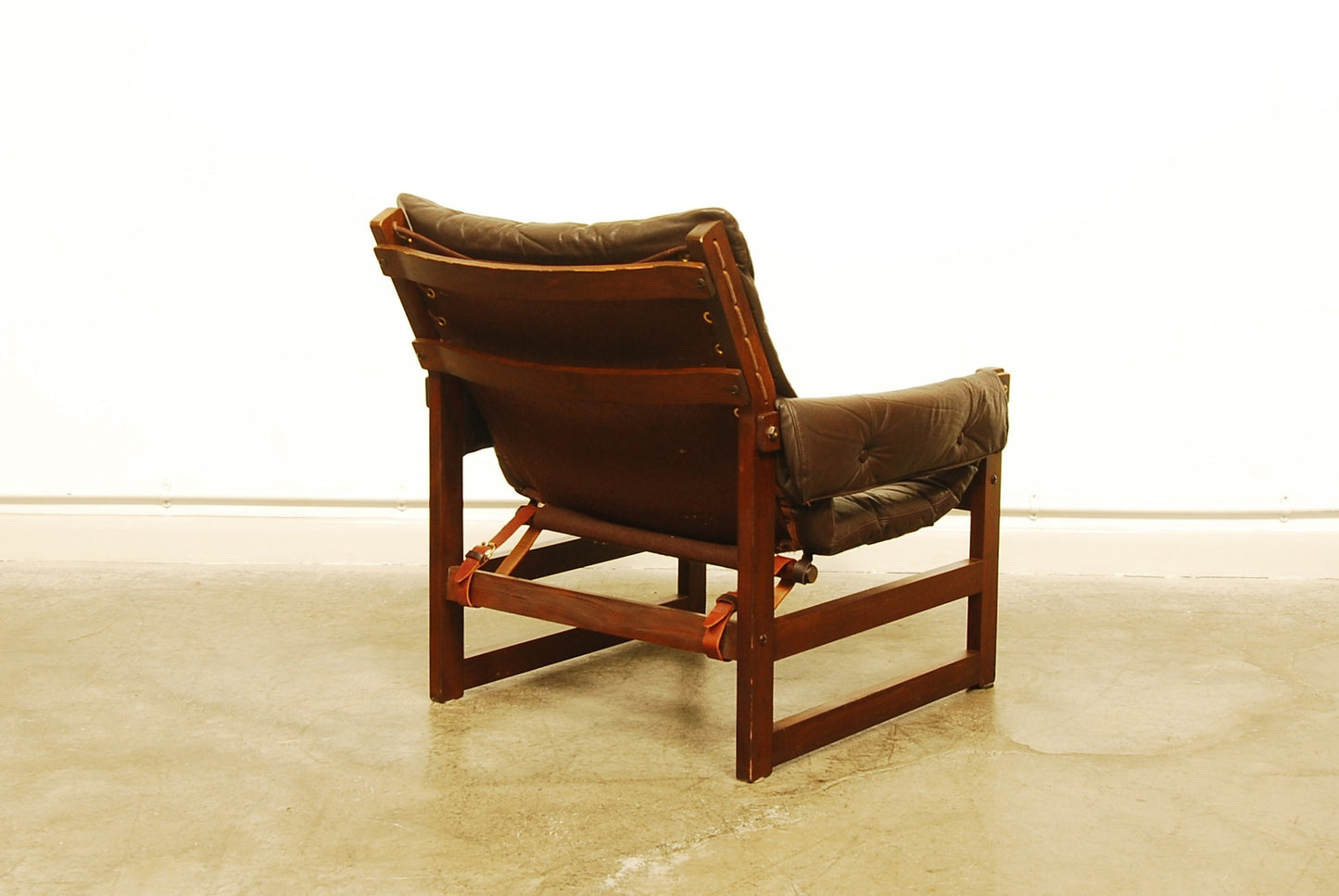 Pair of stained beech lounge chairs