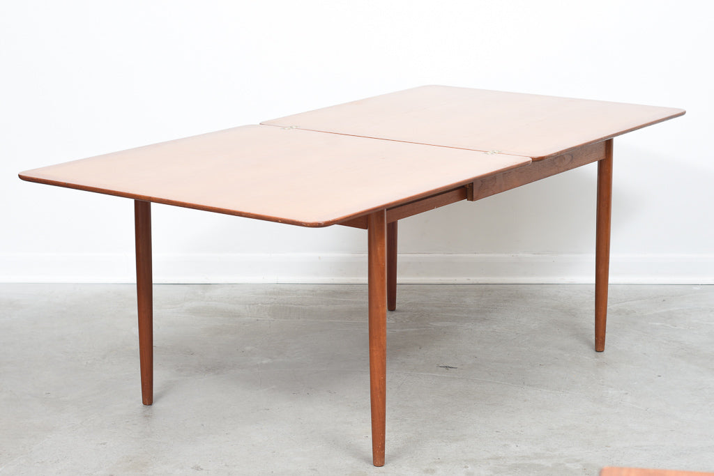 Extending square dining table in teak