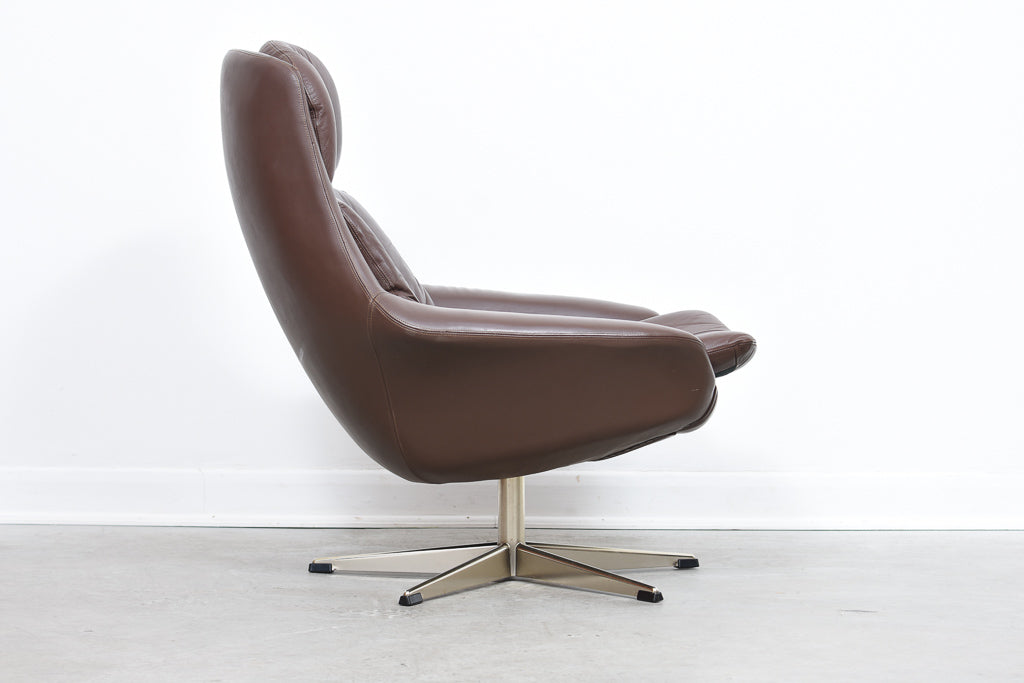 Leather swivel chair by H.W Klein