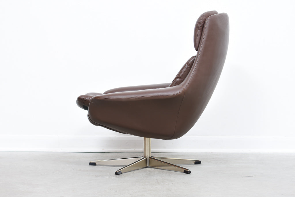 Leather swivel chair by H.W Klein