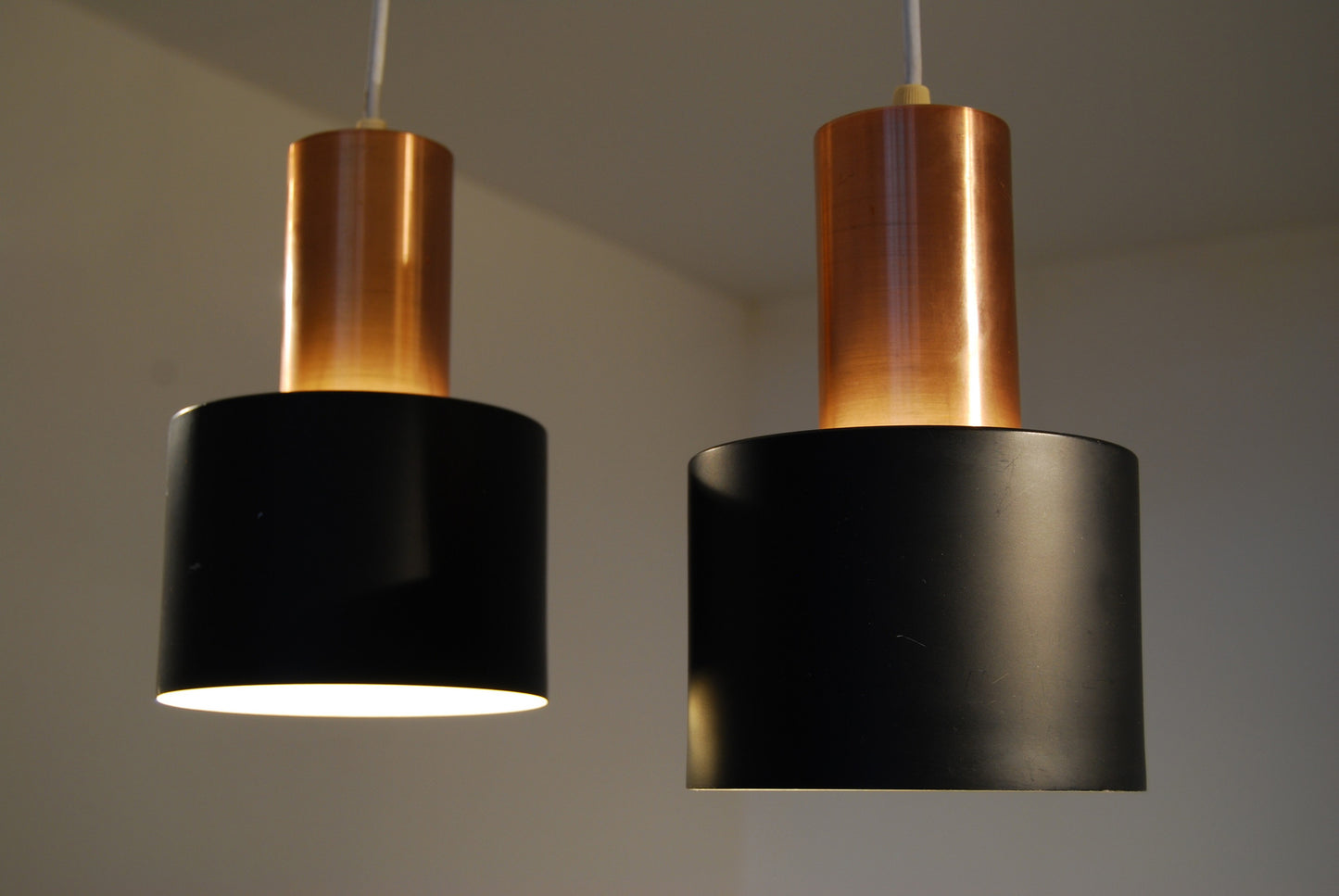 Pair of black & copper pendant lights