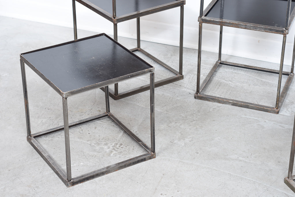 One left: Welded steel stacking tables