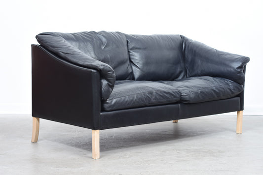 Two seat leather sofa by Stouby