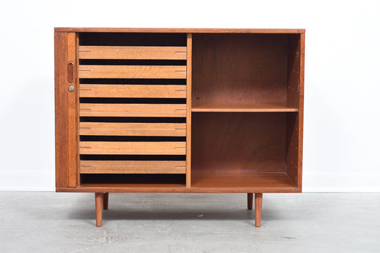 Teak storage unit with tambour door