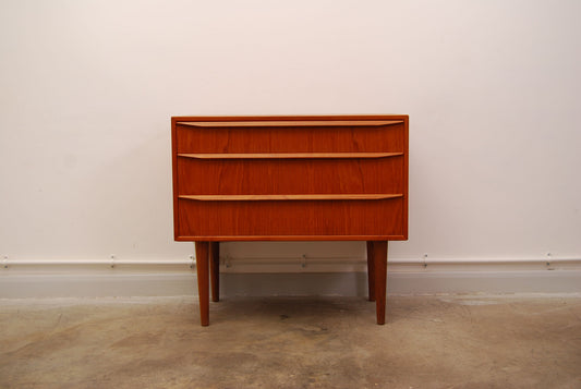 Short teak chest of drawers