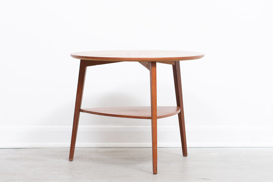 Round teak coffee table