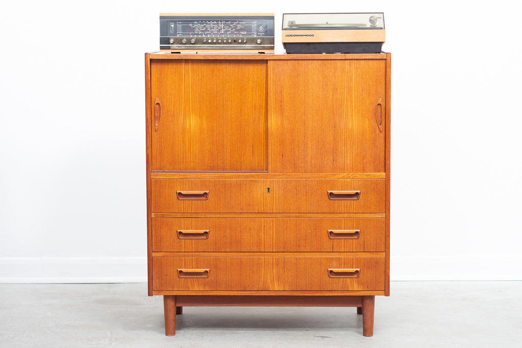 Low teak storage cabinet