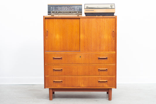 Low teak storage cabinet