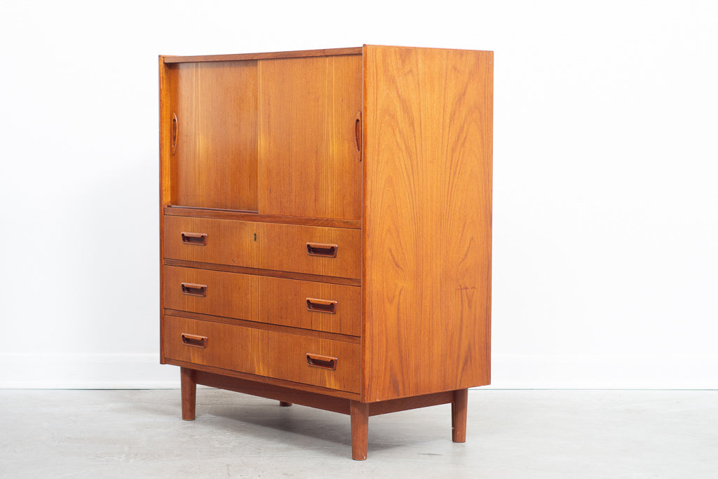 Low teak storage cabinet