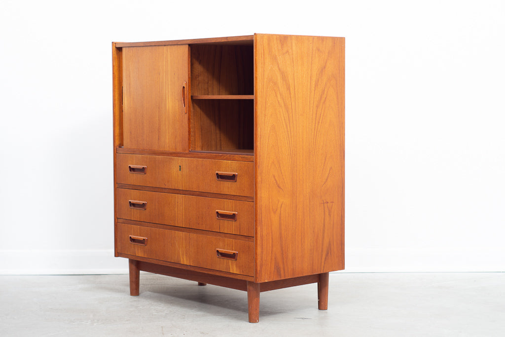 Low teak storage cabinet