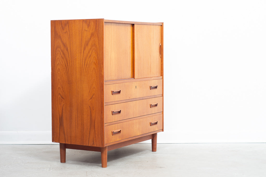 Low teak storage cabinet