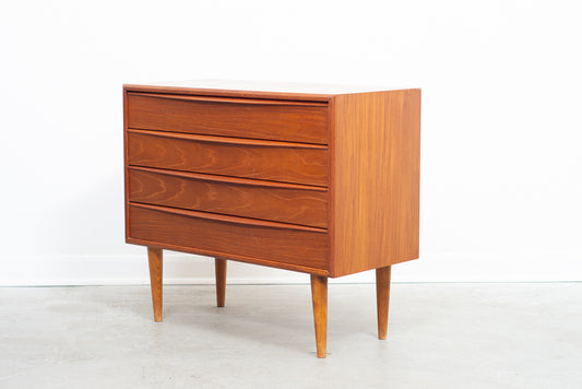 Low chest of teak drawers