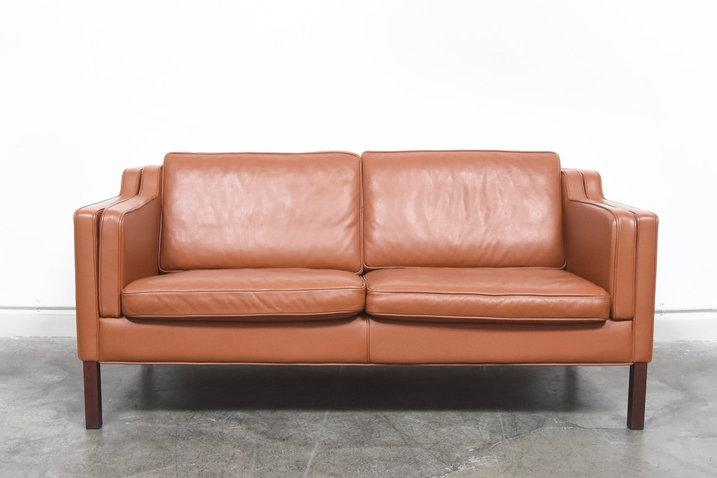 Two seater in cognac leather