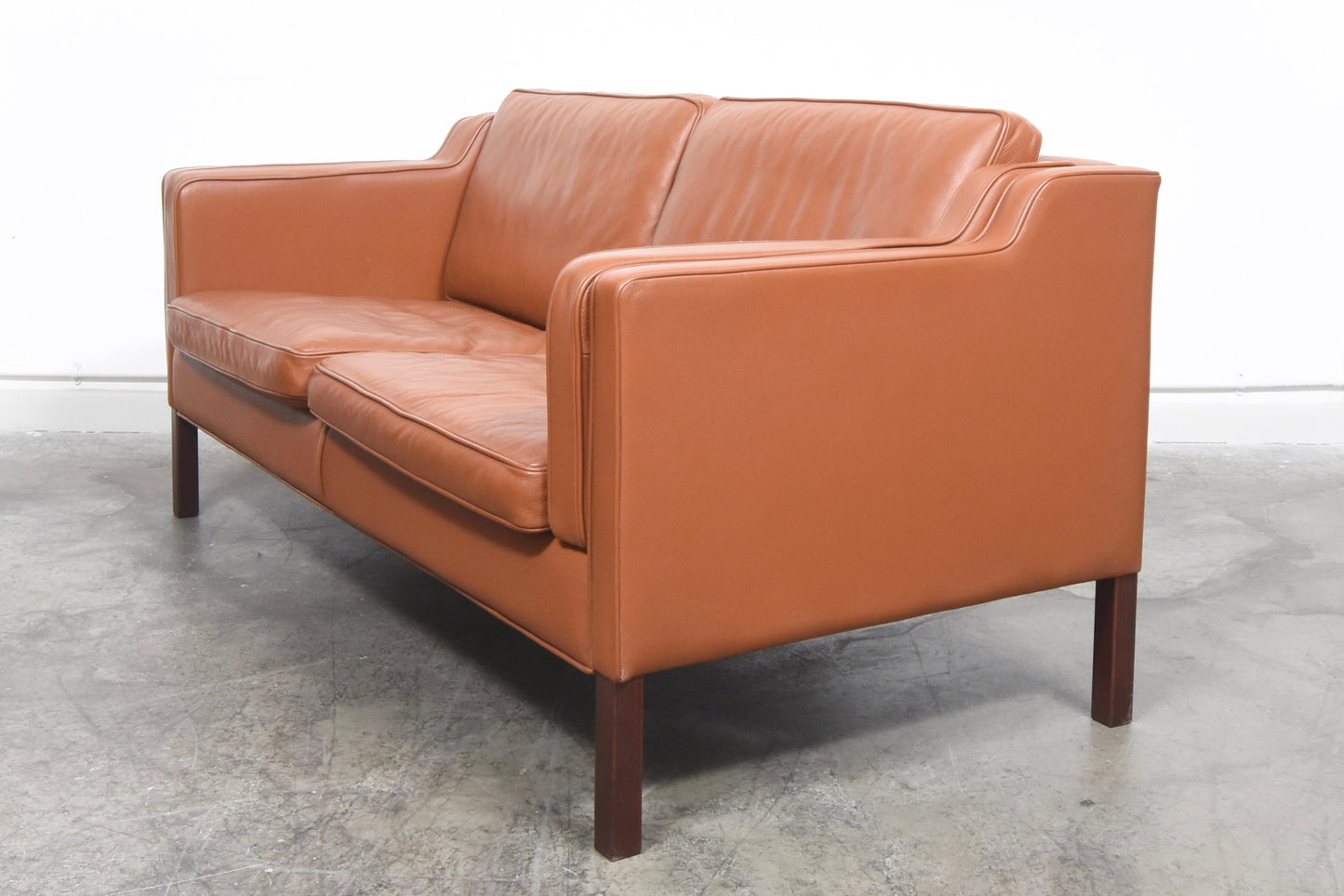 Two seater in cognac leather