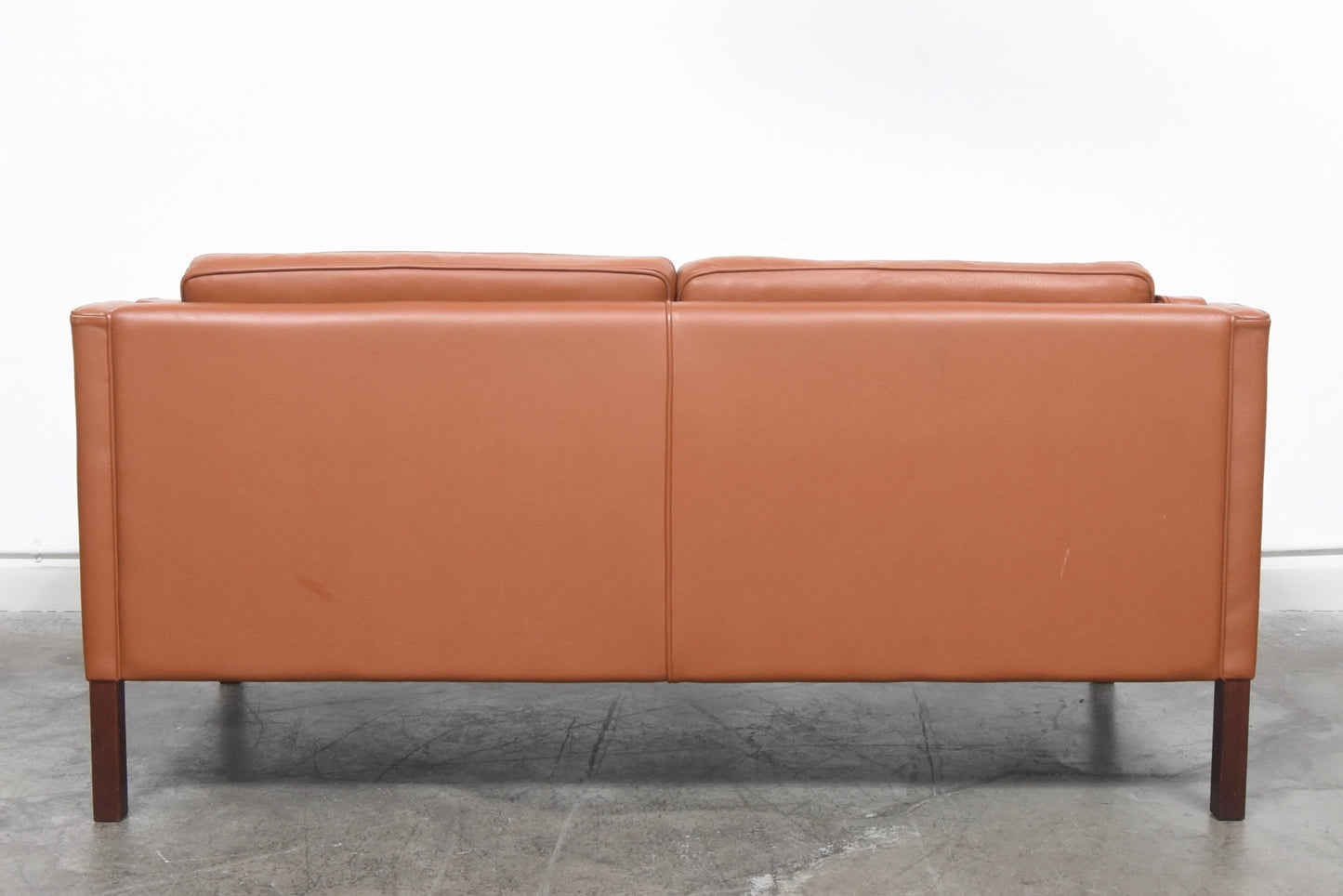 Two seater in cognac leather