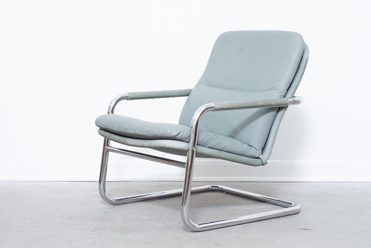 Leather + steel lounger by DUX