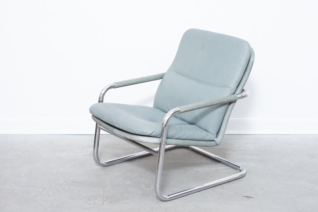 Leather + steel lounger by DUX