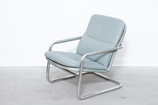 Leather + steel lounger by DUX