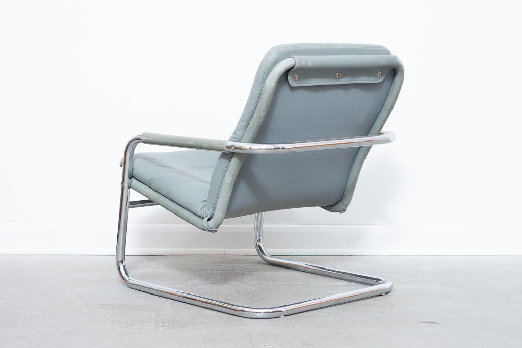 Leather + steel lounger by DUX