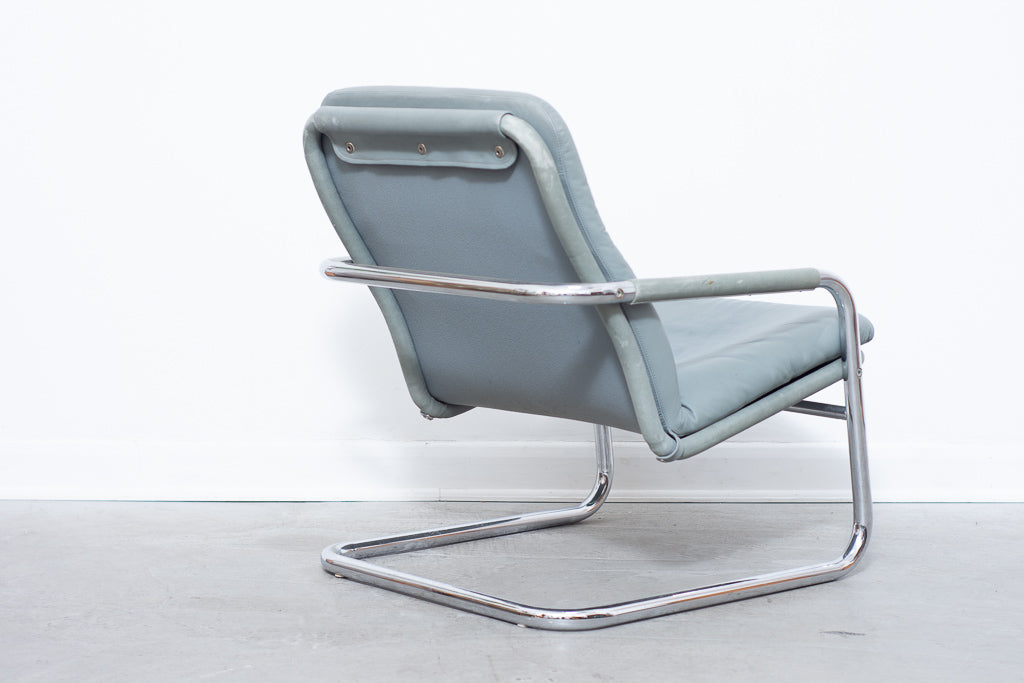 Leather + steel lounger by DUX