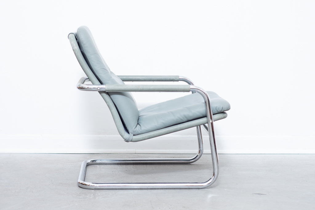 Leather + steel lounger by DUX