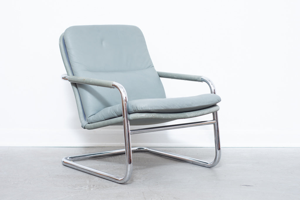 Leather + steel lounger by DUX