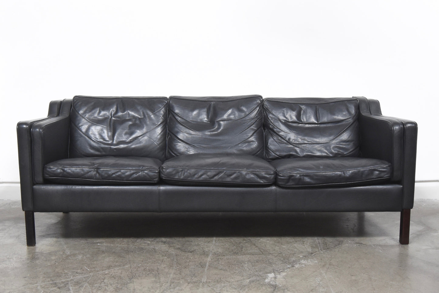 Black leather three seater by Stouby