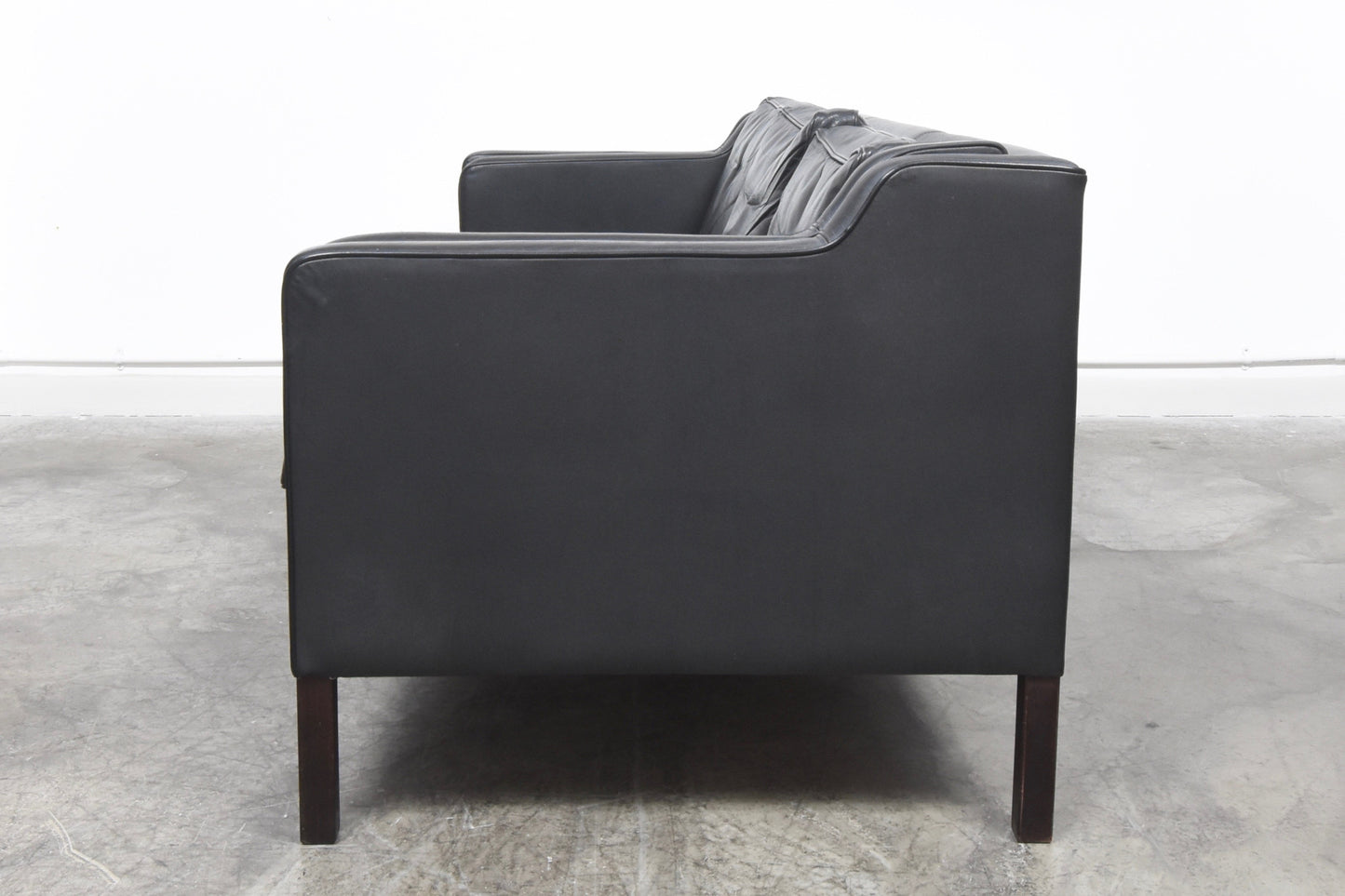 Black leather three seater by Stouby