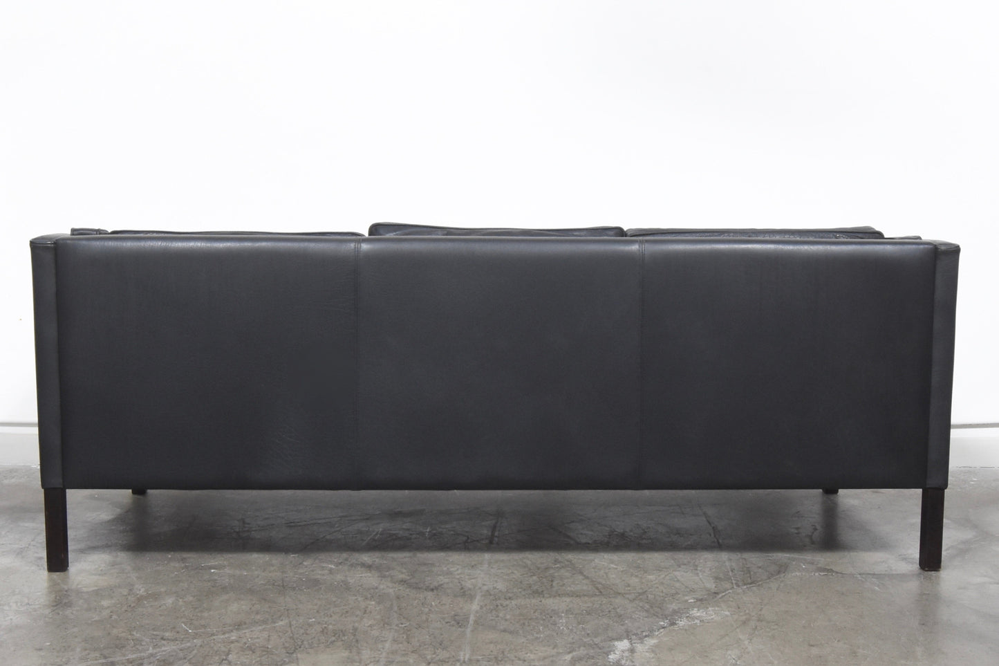 Black leather three seater by Stouby