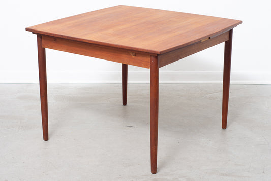 Extending square dining table in teak