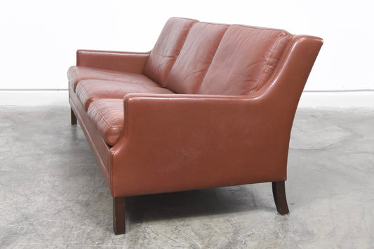 Chocolate leather three seater