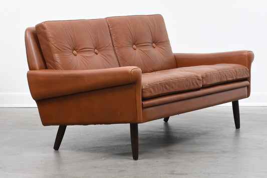 Two seat leather sofa by Svend Skipper