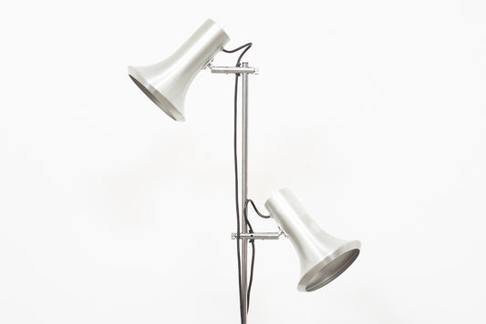 Twin-headed floor lamp with metallic finish