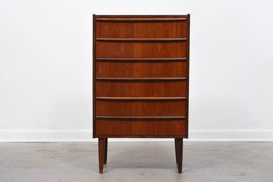 Chest of six drawers with lipped handles