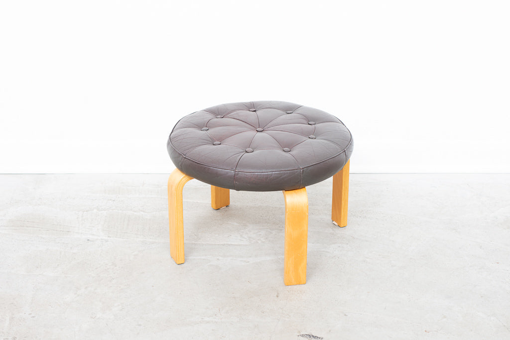 Leather foot stool with beech ply legs