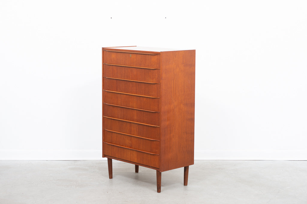 Tall chest of eight drawers in teak