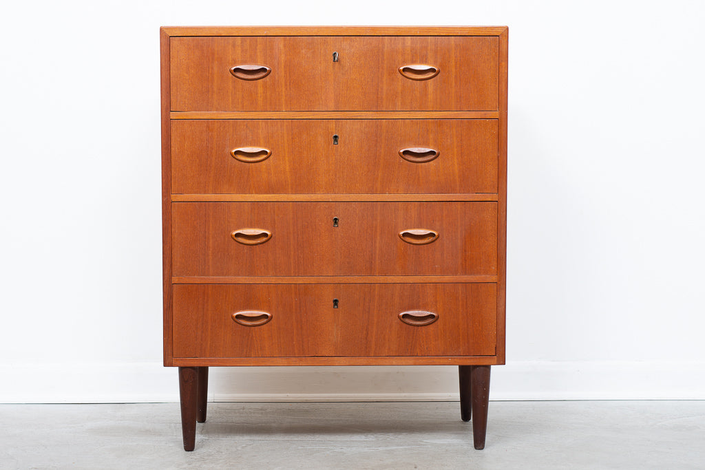 Teak chest of four drawers