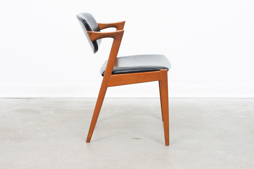 Model 42 chair in teak + vinyl by Kai Kristiansen