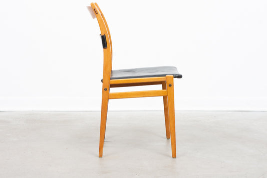 Leather + beech dining chairs by Yngve Ekström