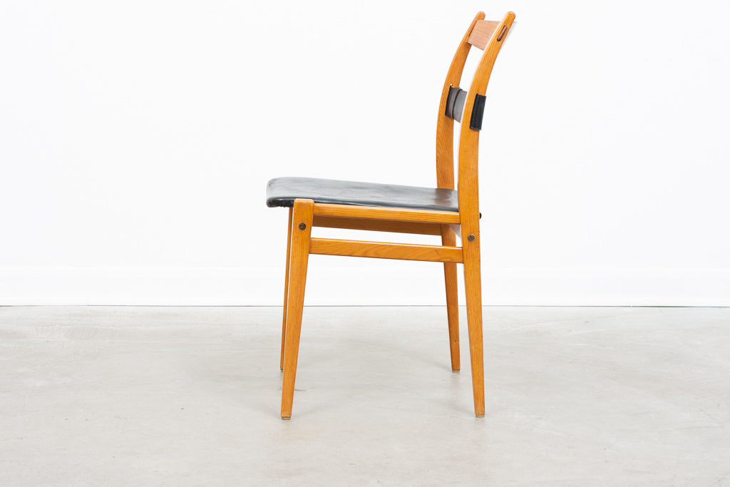 Leather + beech dining chairs by Yngve Ekström
