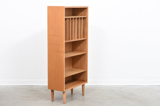 Tall + narrow 1970s oak storage cabinet