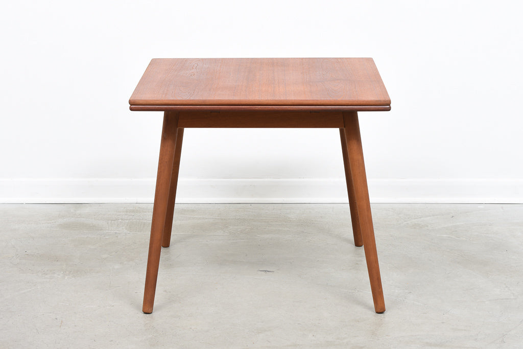 Teak extending dining table by Poul Volther