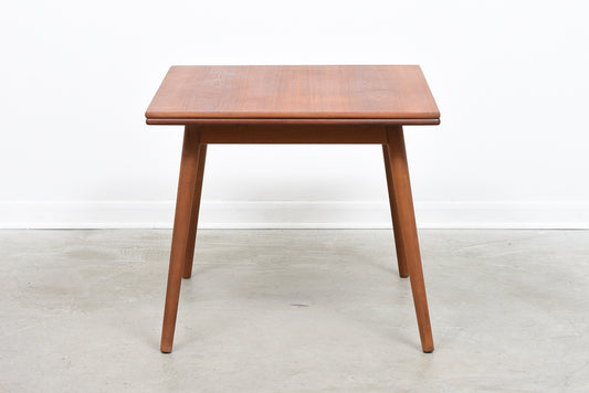 Teak extending dining table by Poul Volther