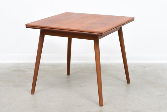 Teak extending dining table by Poul Volther