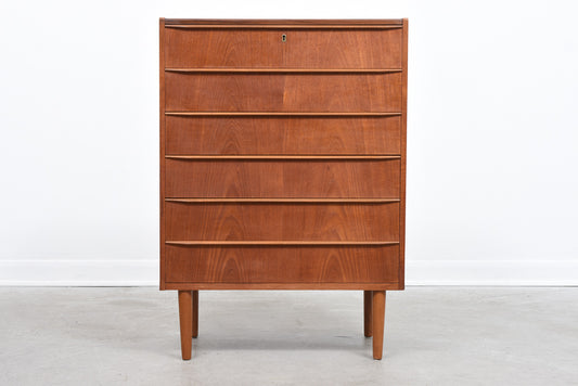 Teak chest of six drawers with lipped handles