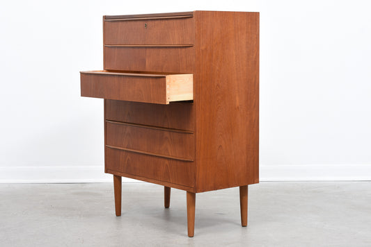 Teak chest of six drawers with lipped handles