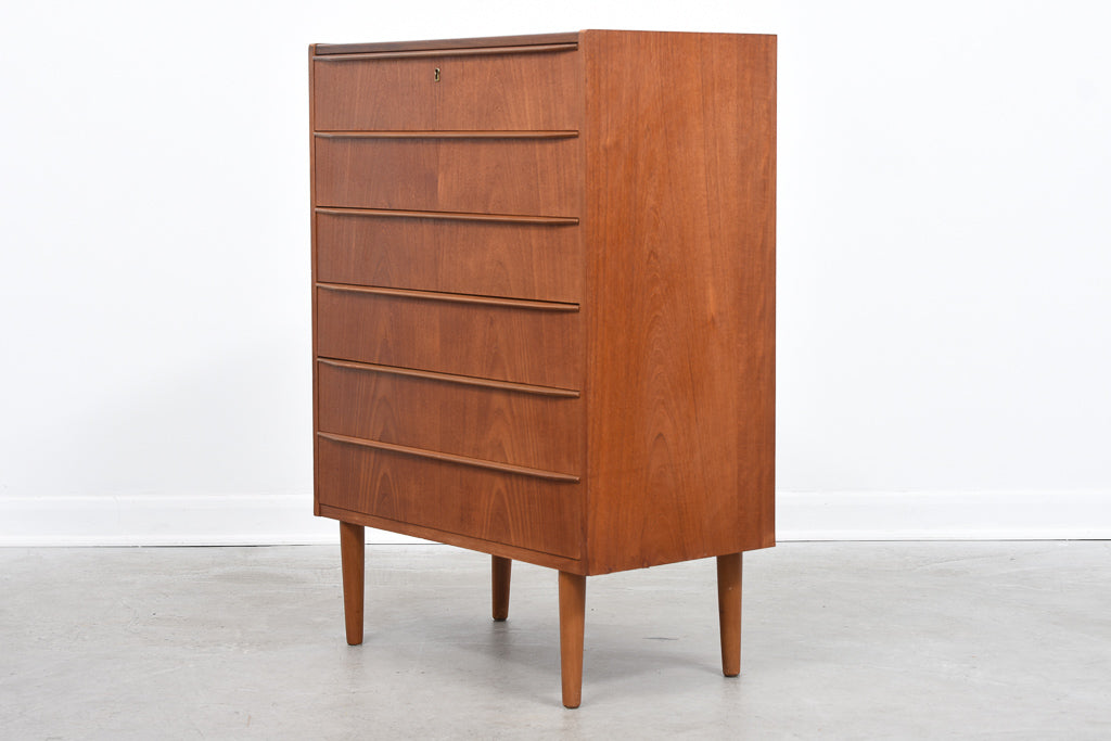 Teak chest of six drawers with lipped handles