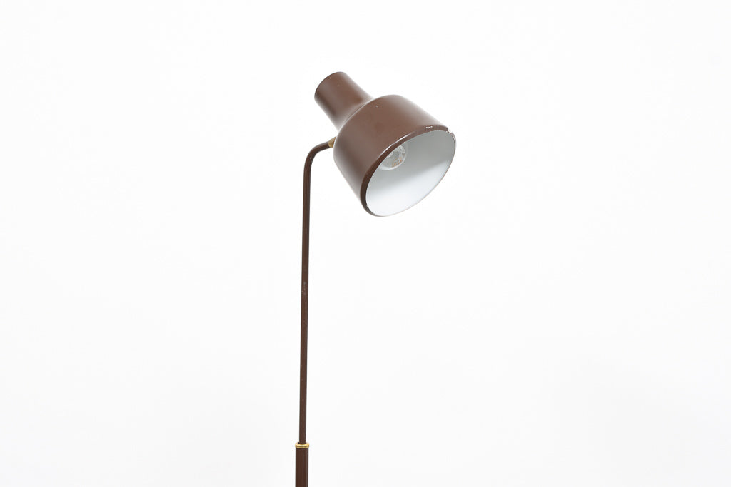 Height-adjustable floor lamp on tripod base