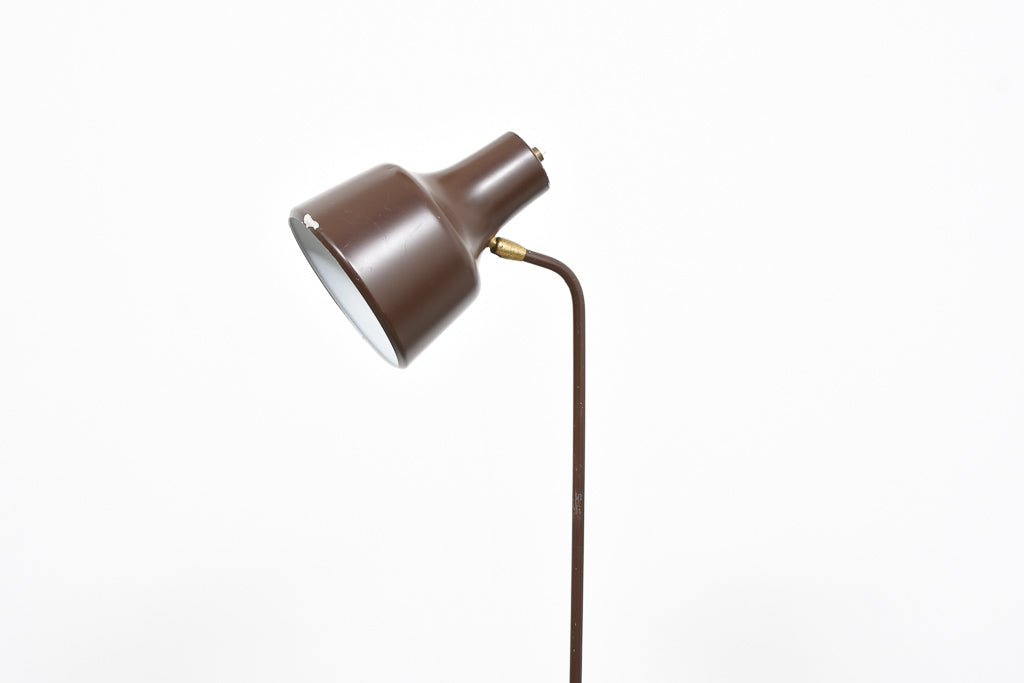 Height-adjustable floor lamp on tripod base