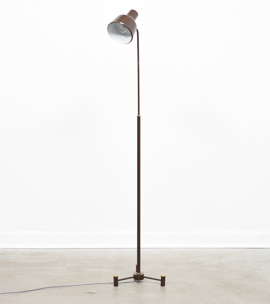 Height-adjustable floor lamp on tripod base